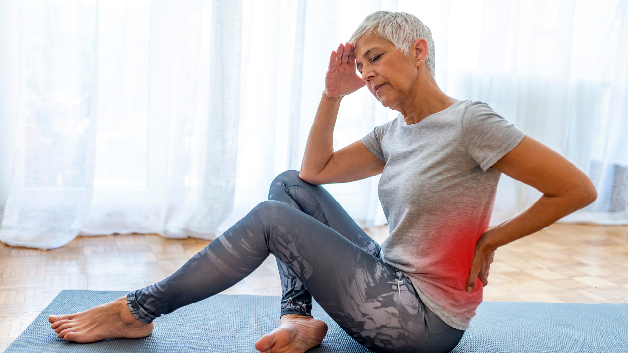 A Woman Suffering From Lower Back Pain who has went to see the back pain experts in lake country