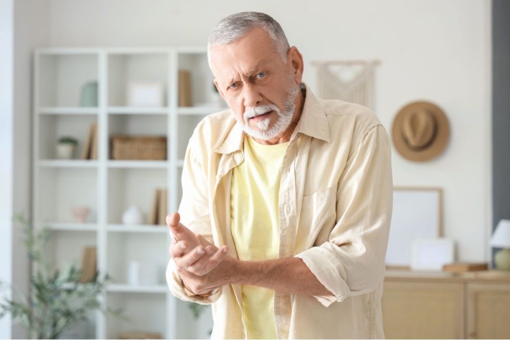 A man struggles with Parkinson's Disease.