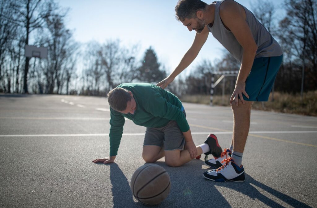 A man suffering from a basketball injury.